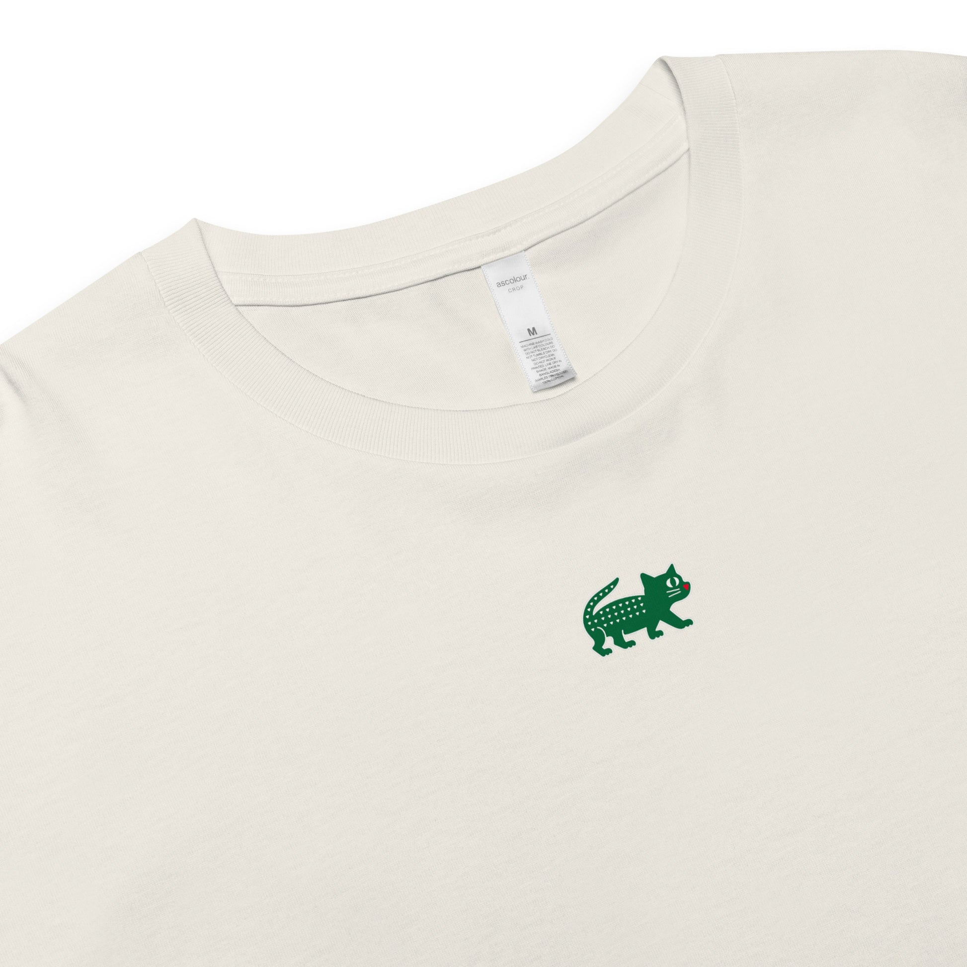 White t-shirt with a green logo on a white background