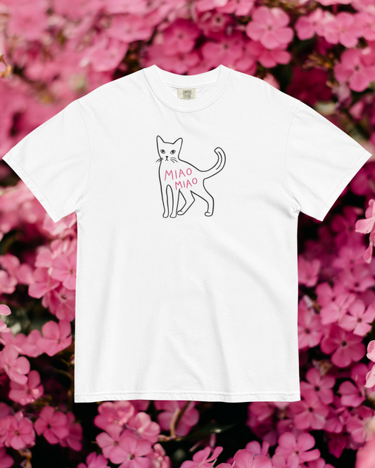 White t-shirt with a cat illustration and 'Miao Miao' text on a pink floral background