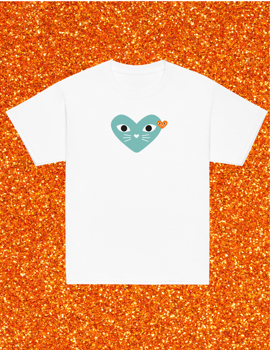 White t-shirt with a heart-shaped design on an orange glittery background