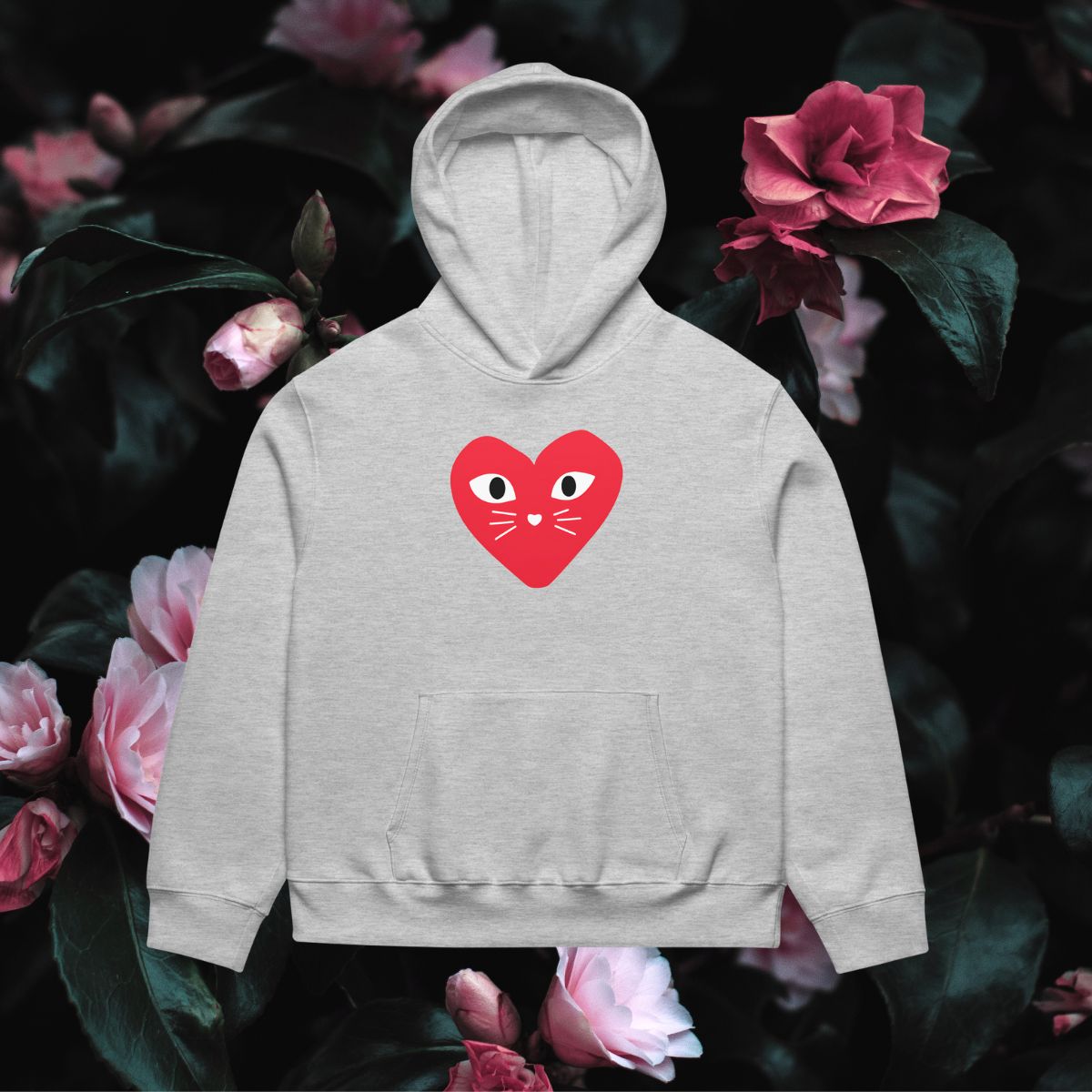 Gray hoodie with a red heart design on a floral background