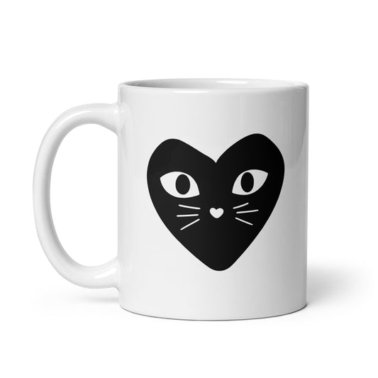 White mug with a black heart-shaped cat design on a white background