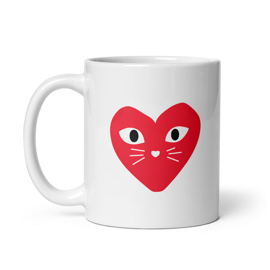 White mug with a red heart-shaped cat face design on a white background