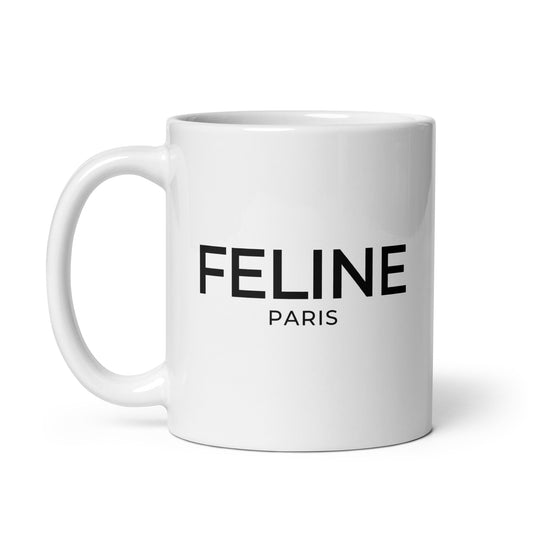 White mug with 'Feline Paris' text on a white background