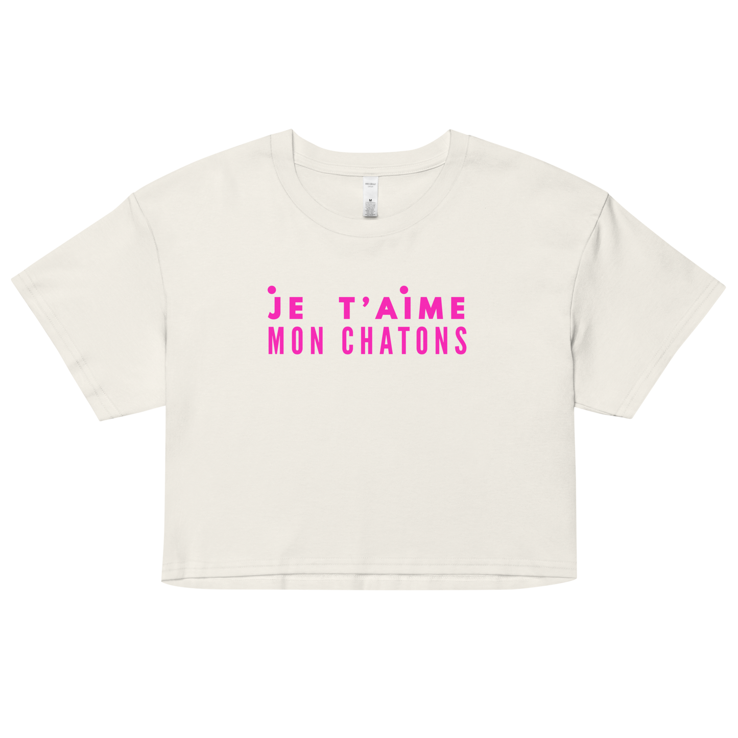 White crop top with pink text on a white background