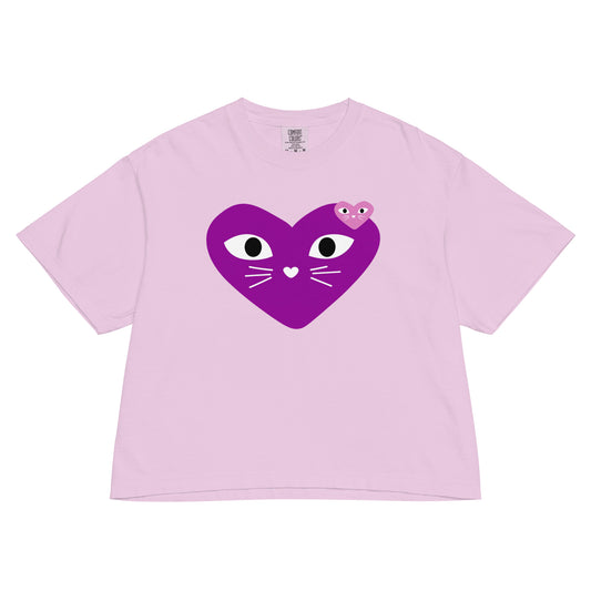 Pink t-shirt with a purple heart-shaped cat face design on a white background