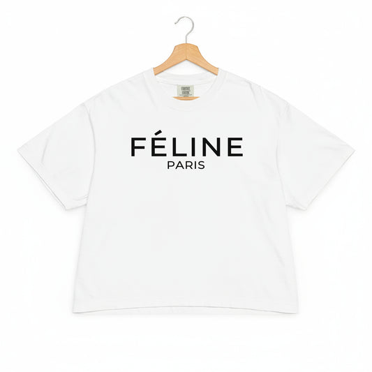 White t-shirt with 'Féline Paris' text on a white background