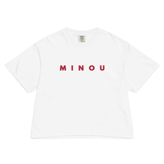 White t-shirt with 'MINOU' printed in red on a white background