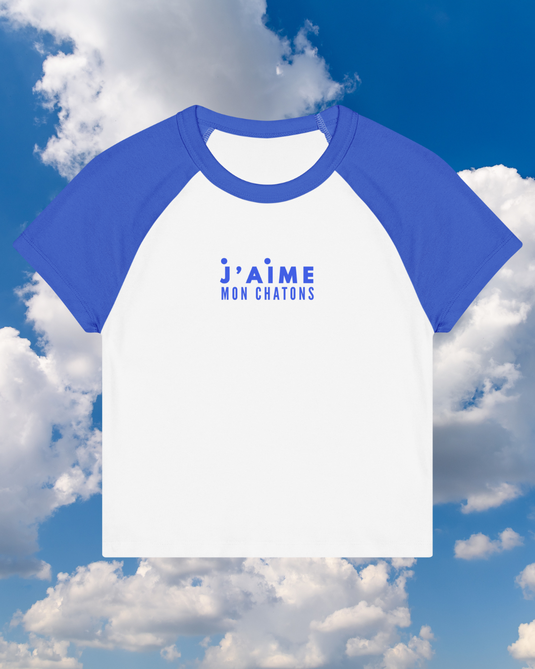 Blue and white baseball shirt with 'j'aime mon chatons' text against a cloudy sky background