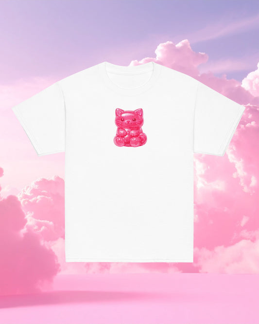 White t-shirt with a pink gummy bear design on a pink and purple cloud background