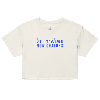 White crop top with blue text 'Je t'aime mon chatons' on a white background