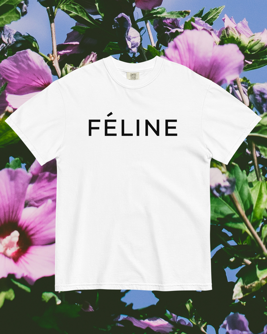 White t-shirt with 'Féline' text on a floral background