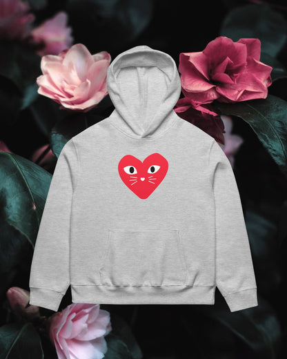 Gray hoodie with a red heart design on a floral background