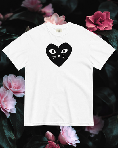 White t-shirt with a black heart-shaped cat design on a floral background