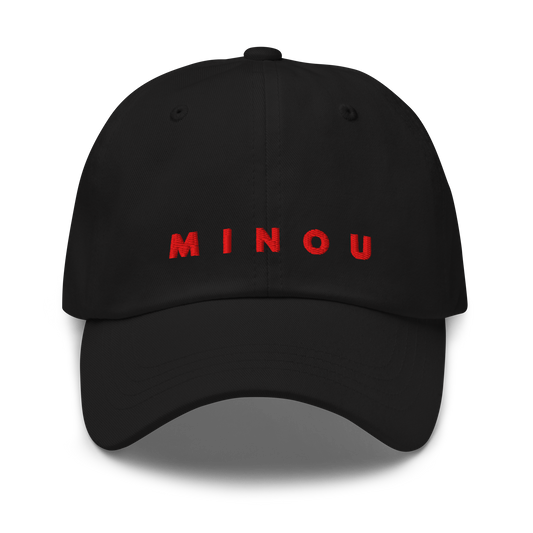 Black cap with red 'MINOU' text on a white background