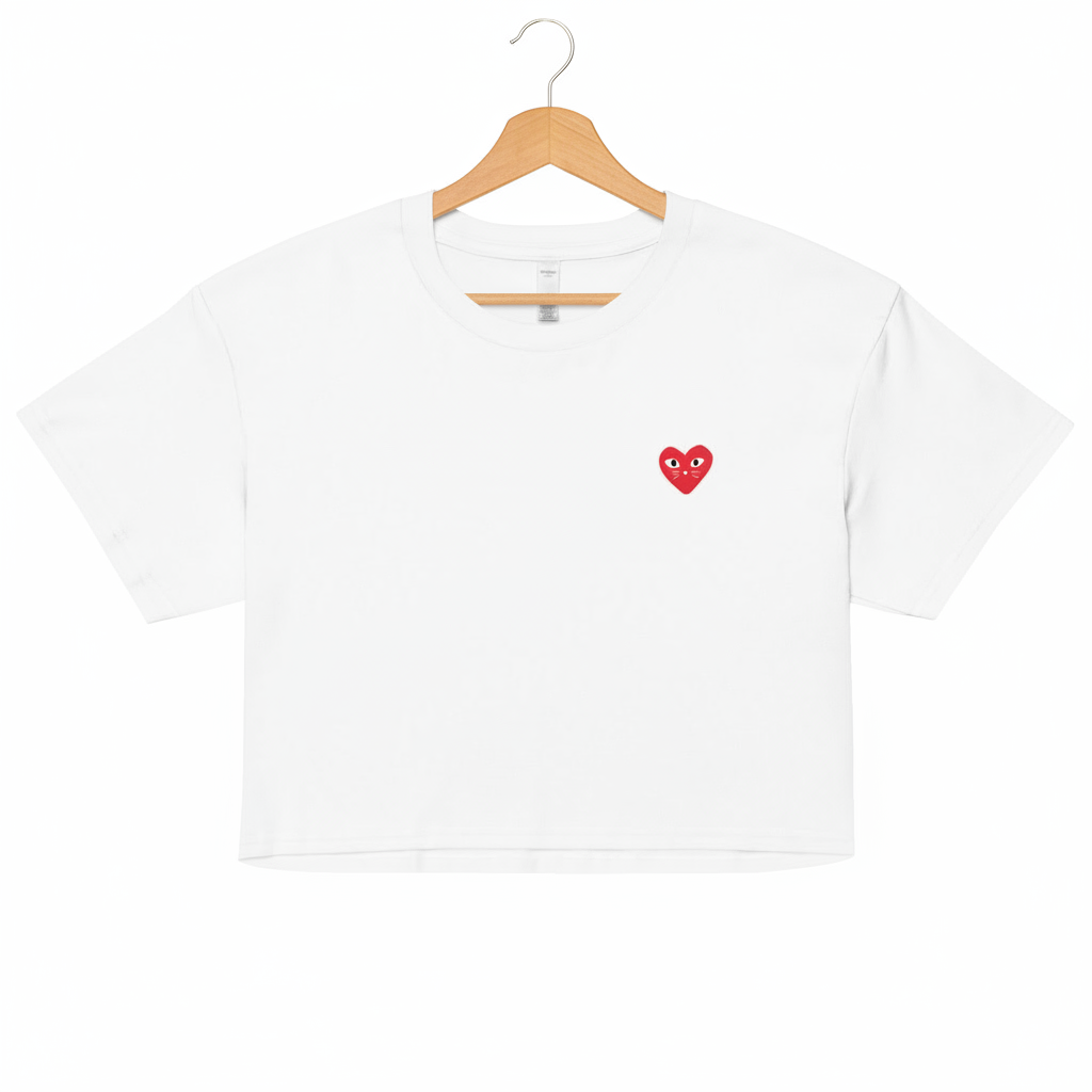 White t-shirt with a red heart logo on a white background