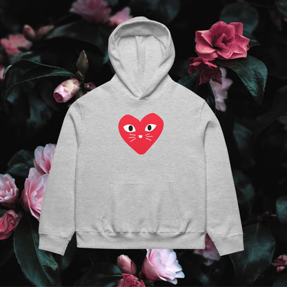 Gray hoodie with a red heart design on a floral background