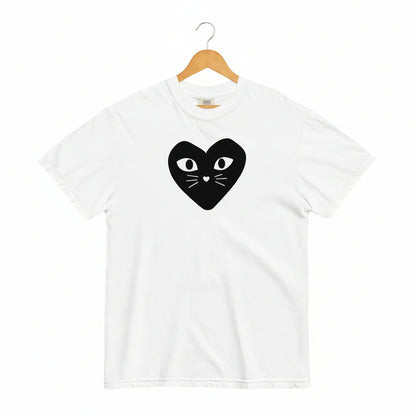 White t-shirt with a black heart-shaped cat design on a white background