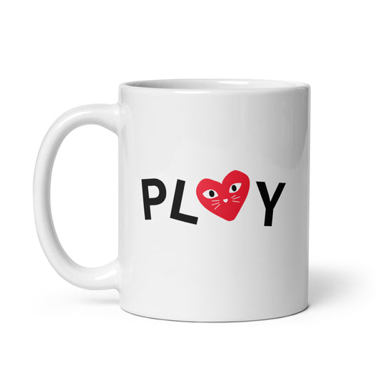 White mug with 'PLOY' text and a red heart design on a white background