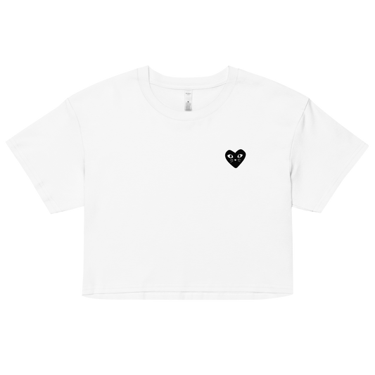 Cropped white cotton cat t-shirt with red heart kitten logo featuring whiskers and eyes, Maison Kitn parody design inspired by Comme des Garçons.