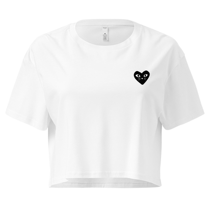 Cropped white cotton cat t-shirt with red heart kitten logo featuring whiskers and eyes, Maison Kitn parody design inspired by Comme des Garçons.
