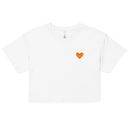 White t-shirt with a small orange logo on a white background