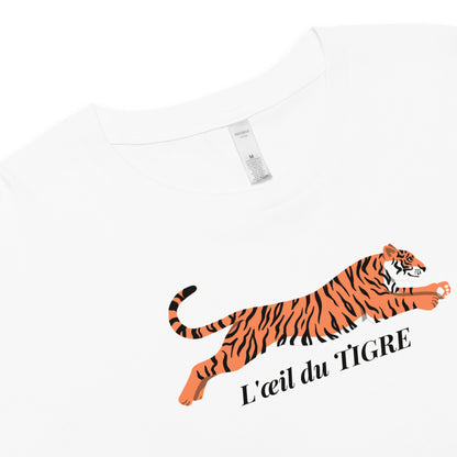 White t-shirt with a tiger graphic and 'L'oeil du Tigre' text on a white background