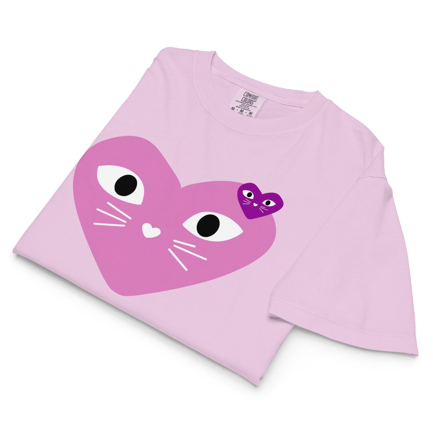 Pink shirt with a heart-shaped cat face design on a white background