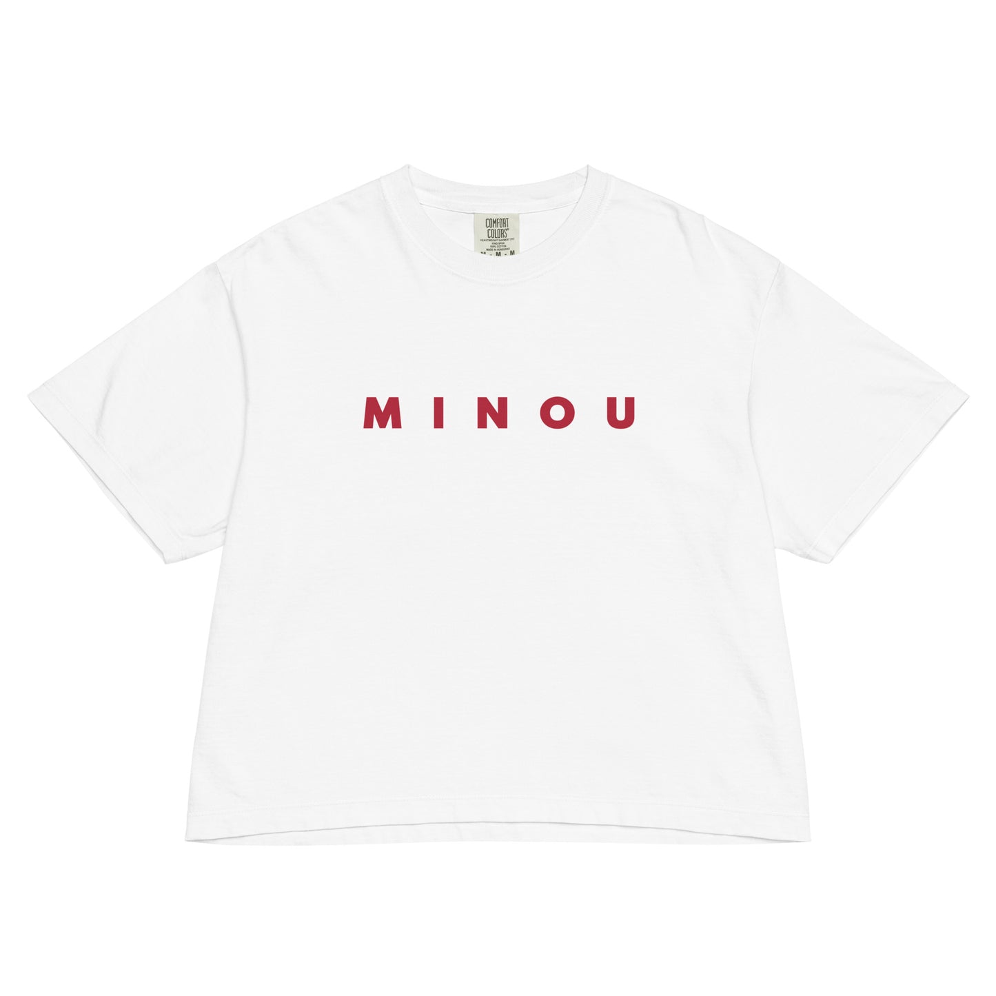 White t-shirt with 'MINOU' printed in red on a white background