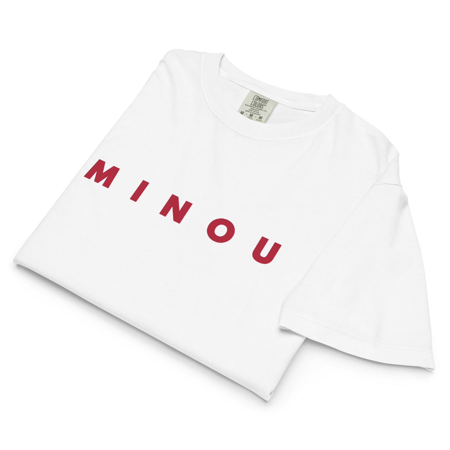 White t-shirt with 'MINOU' printed in red on a white background