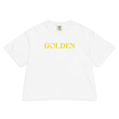 White t-shirt with 'GOLDEN' text in yellow on a white background